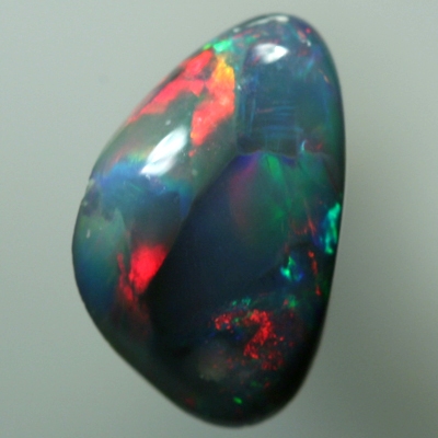 SOLID BLACK OPAL Bright red and turquoise rolling flashes